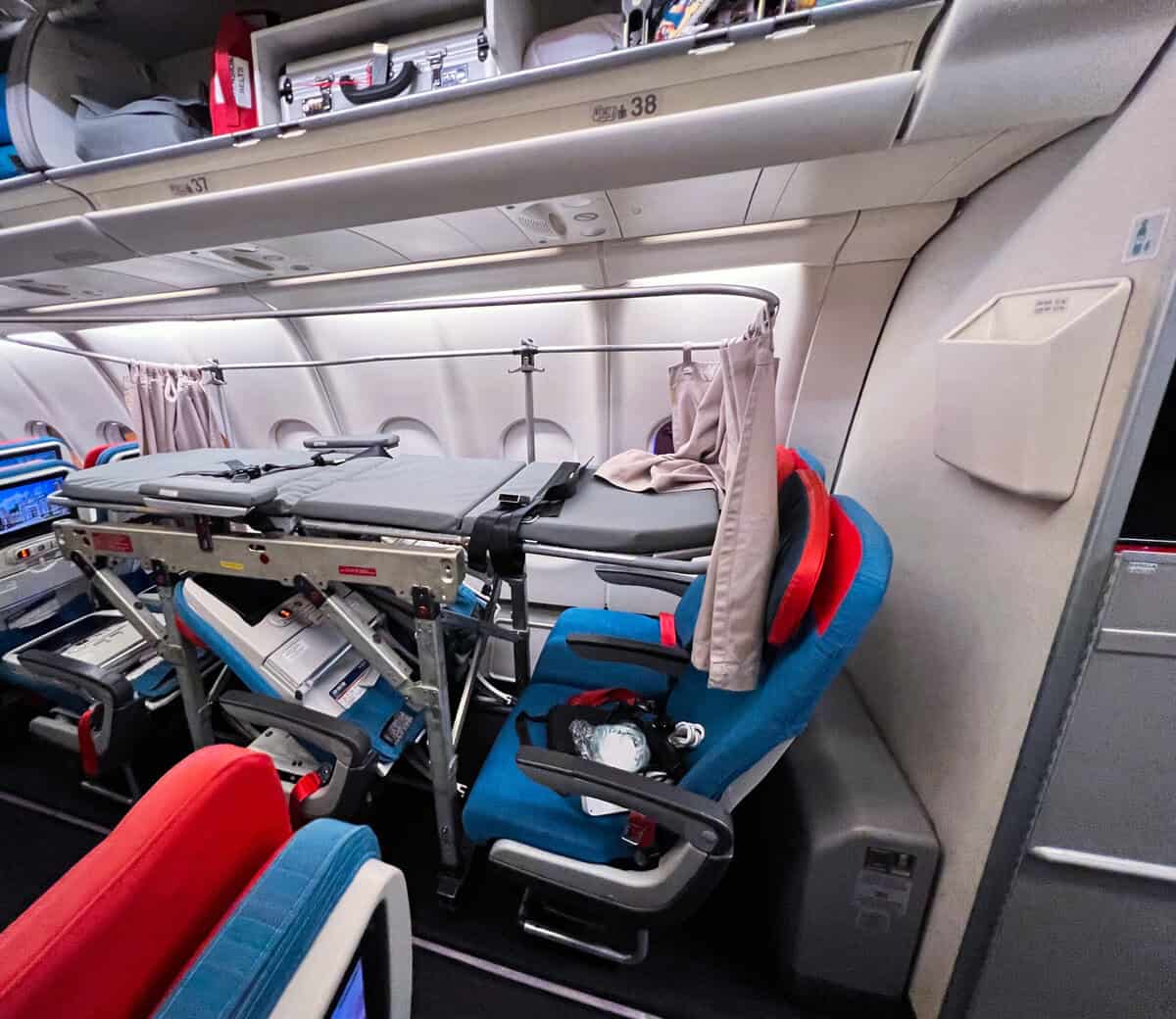 Commercial aircraft cabin used for a medically escorted patient journey