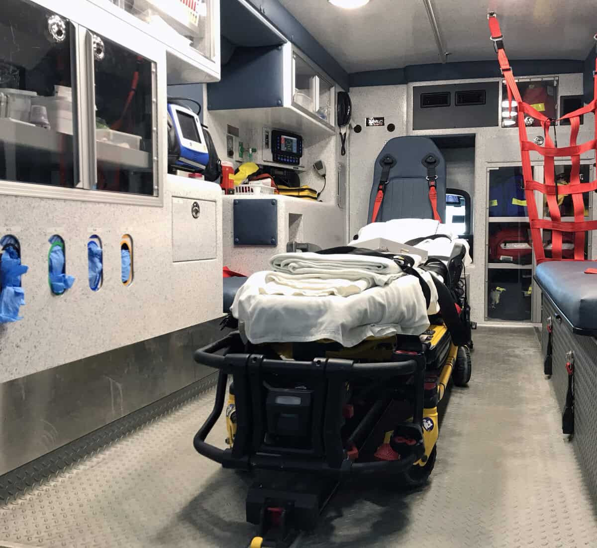 Patient stretcher inside a specialist road ambulance